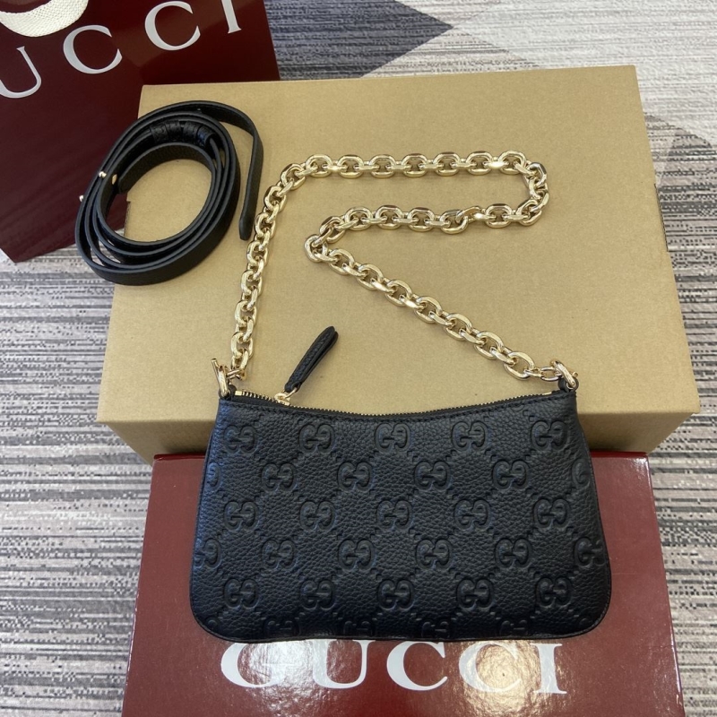 G*u*i satchel bags